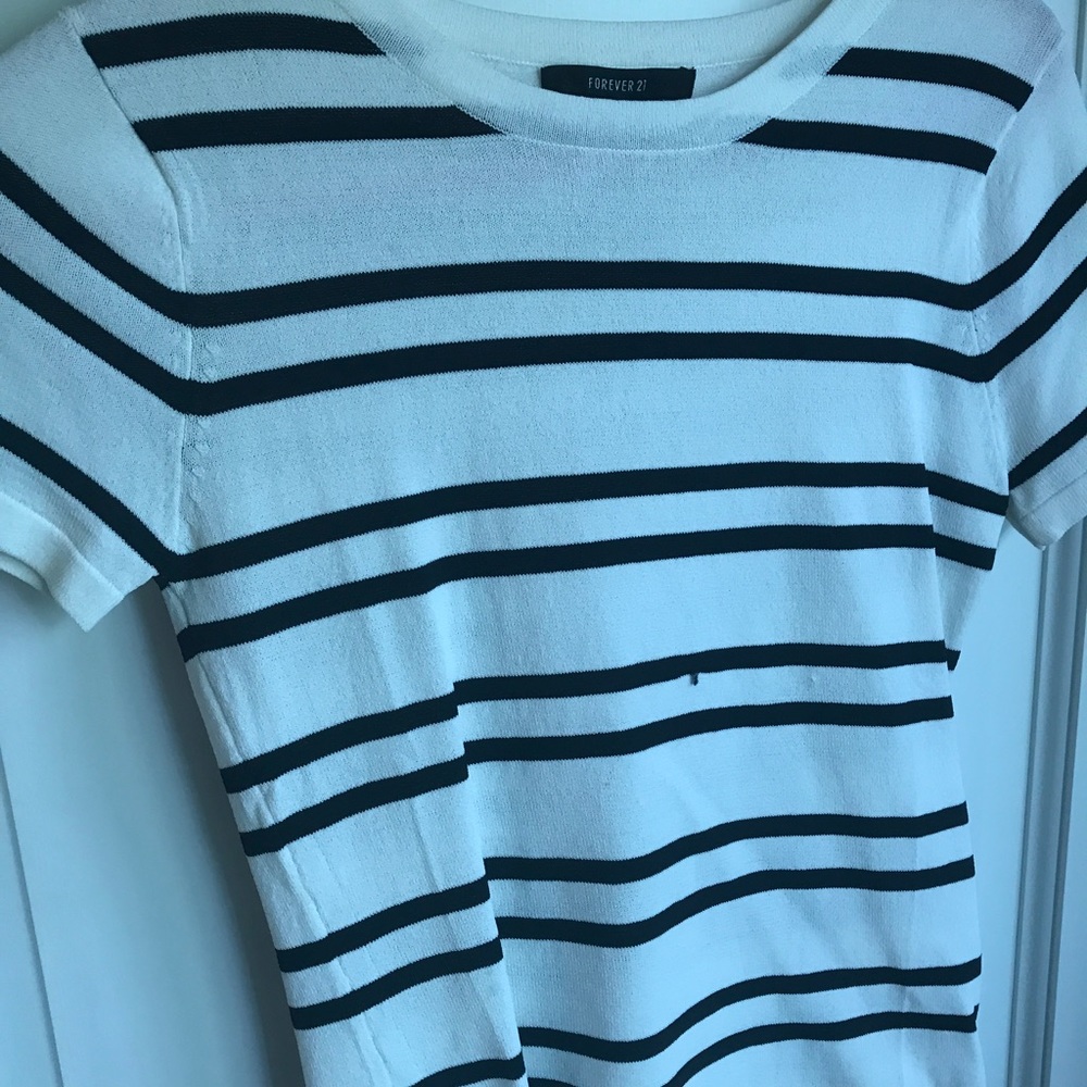 Cream with thin black stripes